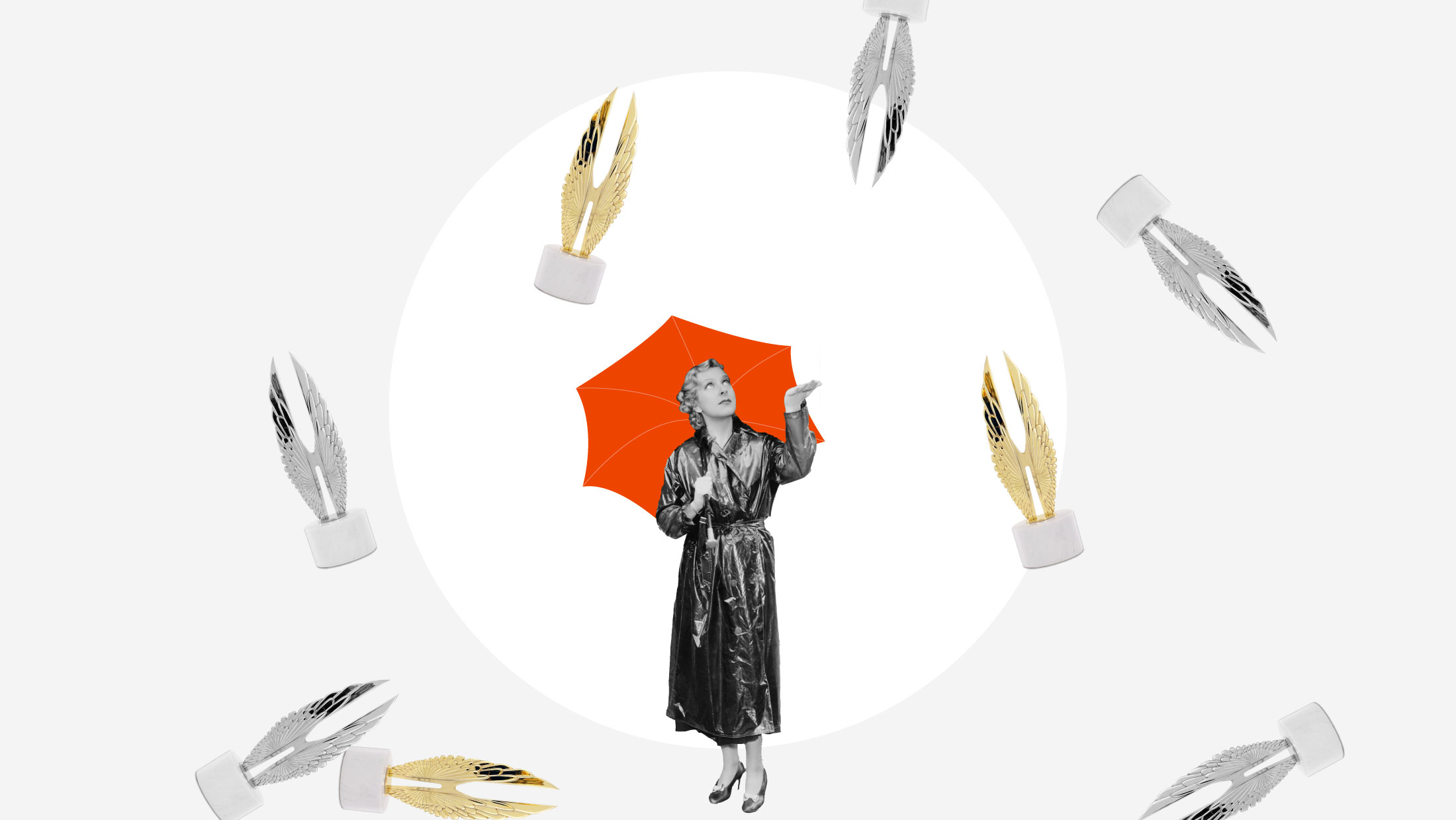 Woman with an umbrella as Hermes Creative Awards rain down.